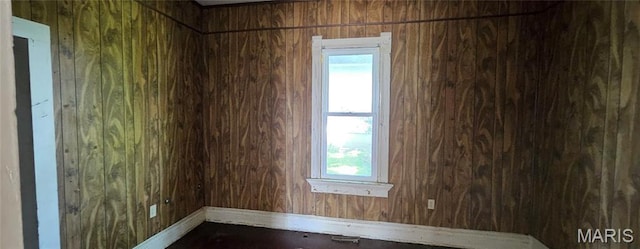 718 2nd St W, Scott City, MO 63780 - empty room featuring wood walls