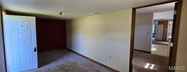 718 2nd St W, Scott City, MO 63780 - carpeted spare room with baseboards