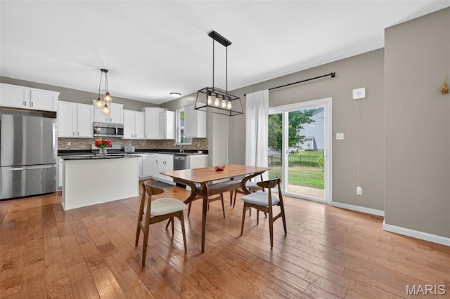 907 Wilderness Way Dr, Eureka, MO 63025 - dining space featuring light wood finished floors
