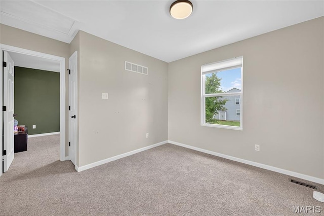 907 Wilderness Way Dr, Eureka, MO 63025 - empty room with carpet flooring and attic access