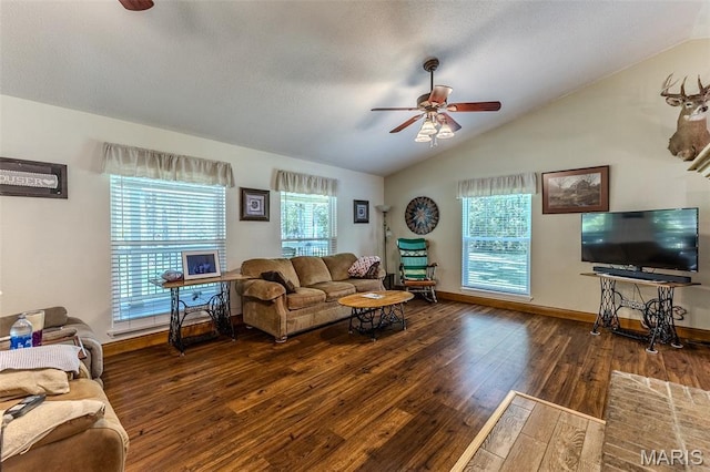 living area featuring a ceiling fan, lofted ceiling, and hardwood / wood-style flooring
