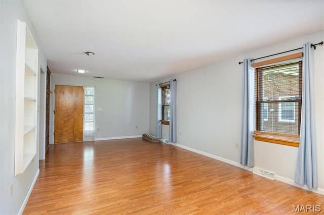 65 Harmon Dr, Lebanon, IL 62254 - unfurnished room featuring light wood finished floors