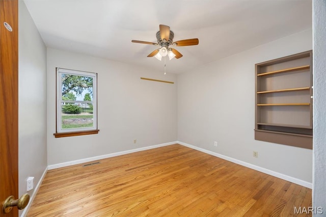 65 Harmon Dr, Lebanon, IL 62254 - unfurnished room with ceiling fan and light wood-type flooring