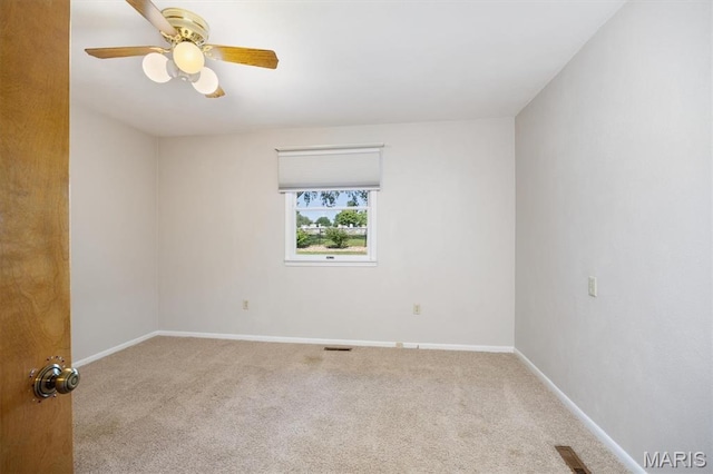65 Harmon Dr, Lebanon, IL 62254 - unfurnished room featuring carpet floors and a ceiling fan