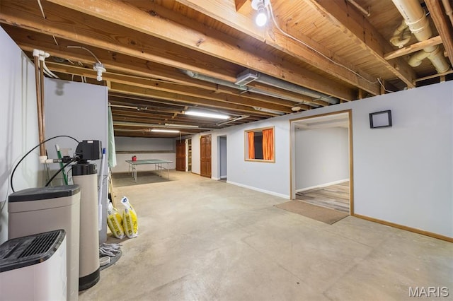 65 Harmon Dr, Lebanon, IL 62254 - basement featuring a water softener and baseboards