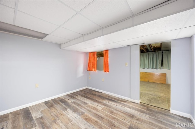 65 Harmon Dr, Lebanon, IL 62254 - finished below grade area featuring a paneled ceiling and wood finished floors