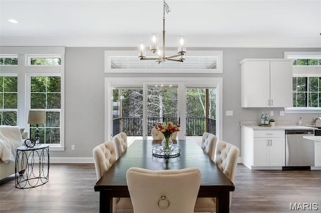 10 Schaper Farms Ct, Foristell, MO 63348 - dining space featuring a chandelier, dark wood-type flooring, healthy amount of natural light, recessed lighting, and ornamental molding