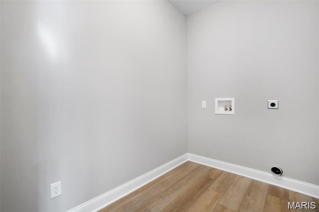 10 Schaper Farms Ct, Foristell, MO 63348 - laundry room with electric dryer hookup, wood finished floors, and washer hookup