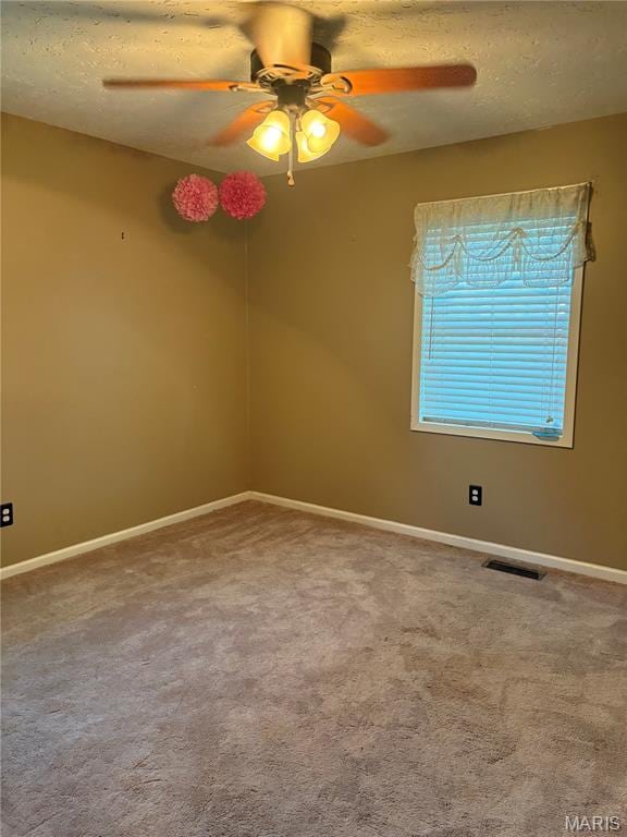 305 Manor, Steele, MO 63877 - spare room with a ceiling fan and carpet floors