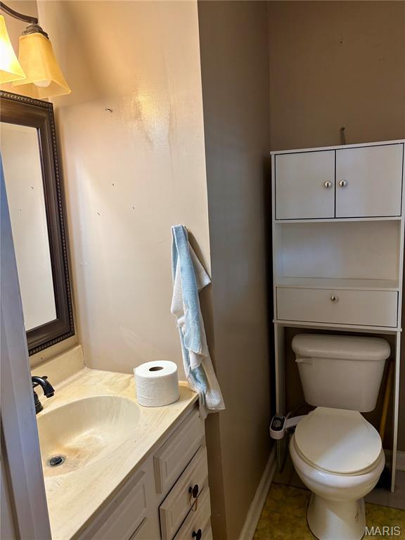305 Manor, Steele, MO 63877 - bathroom featuring vanity and tile patterned flooring