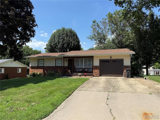 1471 Ladd Ave, Edwardsville, IL 62025 - ranch-style home featuring an attached garage, brick siding, concrete driveway, a front yard, and covered porch