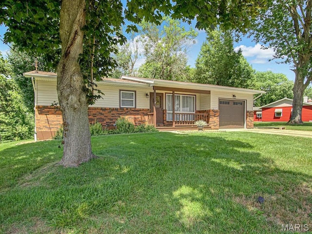 1471 Ladd Ave, Edwardsville, IL 62025 - single story home with brick siding, an attached garage, a porch, and a front yard