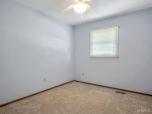 1471 Ladd Ave, Edwardsville, IL 62025 - carpeted empty room featuring ceiling fan and baseboards