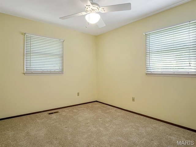 1471 Ladd Ave, Edwardsville, IL 62025 - unfurnished room featuring carpet floors and ceiling fan