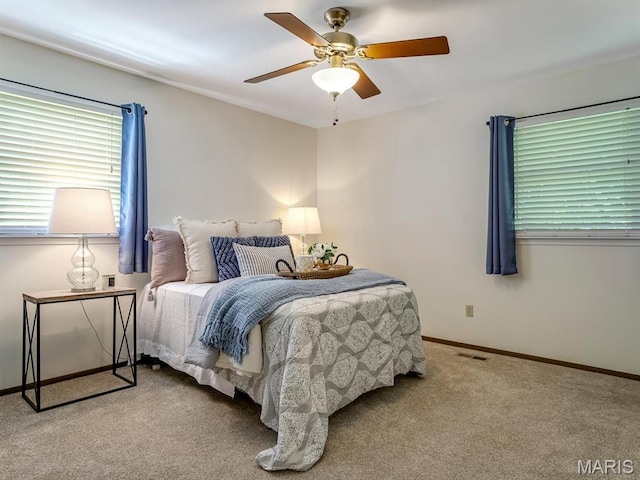 1471 Ladd Ave, Edwardsville, IL 62025 - carpeted bedroom with baseboards and ceiling fan
