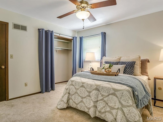 1471 Ladd Ave, Edwardsville, IL 62025 - bedroom with light carpet, a closet, and ceiling fan