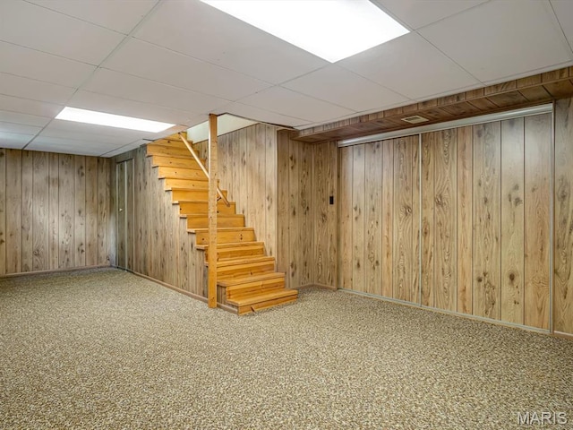 1471 Ladd Ave, Edwardsville, IL 62025 - finished below grade area with stairs, a drop ceiling, wood walls, and carpet flooring