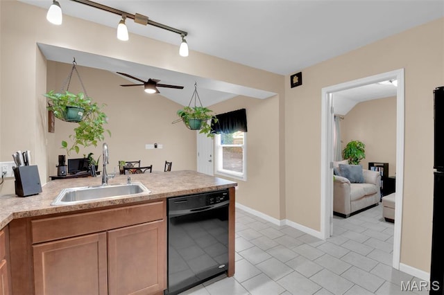 22 Green Acres Rd, Bellefontaine Nghbrs, MO 63137 - kitchen with black dishwasher, a ceiling fan, light countertops, a peninsula, and light tile patterned flooring