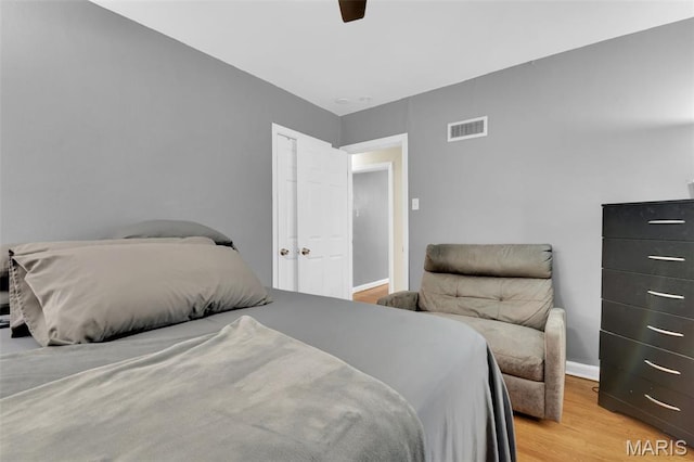 22 Green Acres Rd, Bellefontaine Nghbrs, MO 63137 - bedroom with light wood-style flooring and a ceiling fan