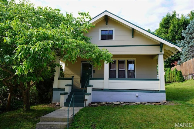 130 E 2nd St, Hermann, MO 65041 - bungalow-style home featuring a porch
