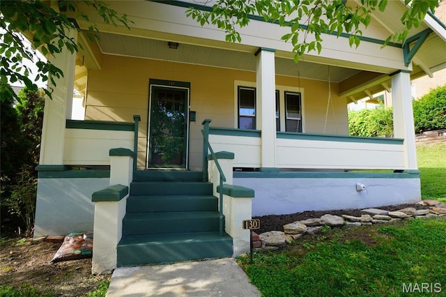 130 E 2nd St, Hermann, MO 65041 - doorway to property with a porch