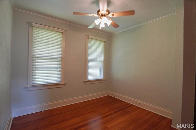 130 E 2nd St, Hermann, MO 65041 - spare room featuring crown molding, wood finished floors, and a ceiling fan