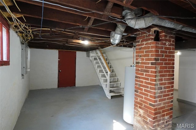 130 E 2nd St, Hermann, MO 65041 - basement featuring water heater and stairway