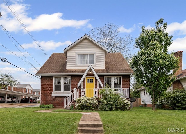 14 S 87th St, Belleville, IL 62223 - view of front of home with brick siding, a front lawn, and a shingled roof