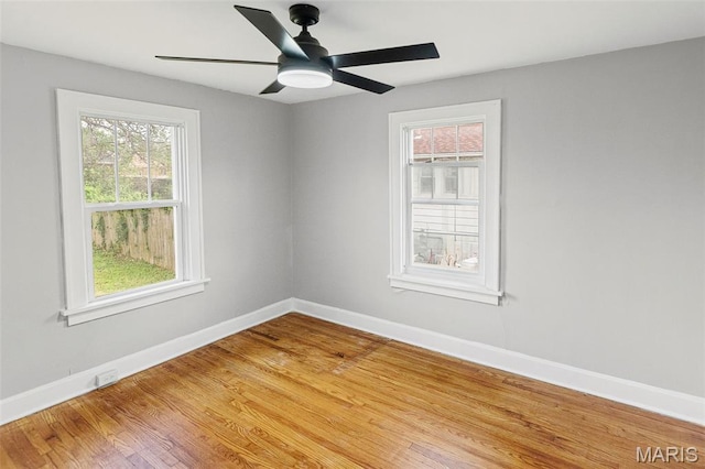 14 S 87th St, Belleville, IL 62223 - spare room featuring light wood finished floors and a ceiling fan