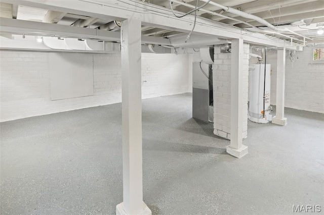 14 S 87th St, Belleville, IL 62223 - unfinished basement with gas water heater and brick wall