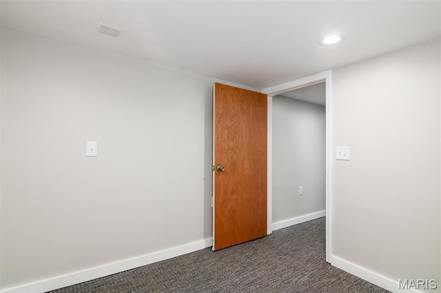 601 E Jefferson St, Ofallon, IL 62269 - spare room featuring dark colored carpet and recessed lighting