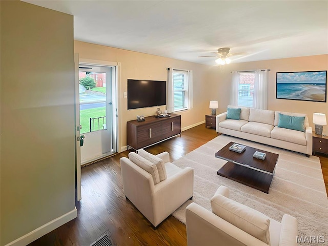 2806 Mohattan Ln, Saint Louis, MO 63125 - living area featuring dark wood-style floors and a ceiling fan