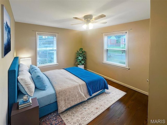 2806 Mohattan Ln, Saint Louis, MO 63125 - bedroom featuring multiple windows, dark wood-style flooring, and a ceiling fan