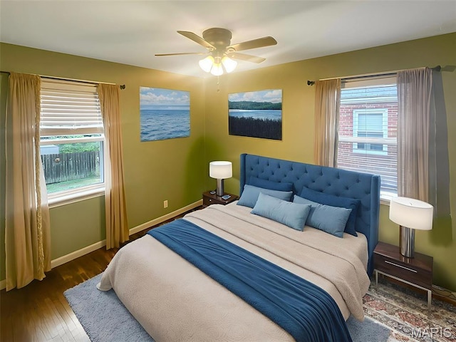 2806 Mohattan Ln, Saint Louis, MO 63125 - bedroom featuring wood finished floors, ceiling fan, and a water view