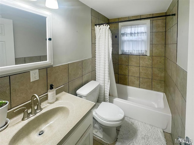 2806 Mohattan Ln, Saint Louis, MO 63125 - bathroom with tile walls, shower / bath combination with curtain, and vanity