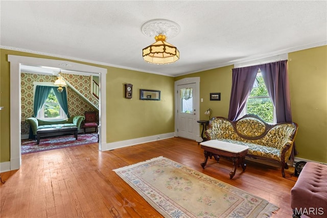 549 E 9th St, Alton, IL 62002 - living area featuring hardwood / wood-style flooring, ornamental molding, and a textured ceiling