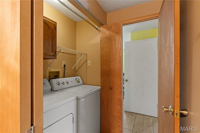 549 E 9th St, Alton, IL 62002 - washroom featuring washing machine and dryer and cabinet space