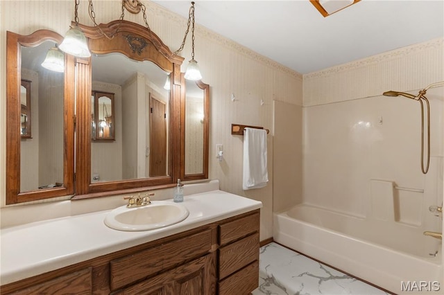 549 E 9th St, Alton, IL 62002 - bathroom featuring vanity, marble look tile flooring, and shower / bathtub combination