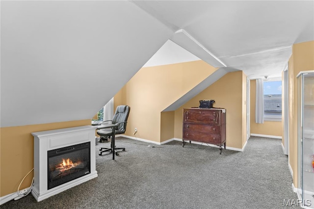 549 E 9th St, Alton, IL 62002 - home office with carpet, lofted ceiling, and a glass covered fireplace
