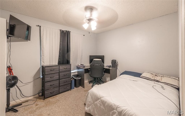 305 Pine Tree Rd, Rolla, MO 65401 - bedroom with carpet flooring, a textured ceiling, and an office area