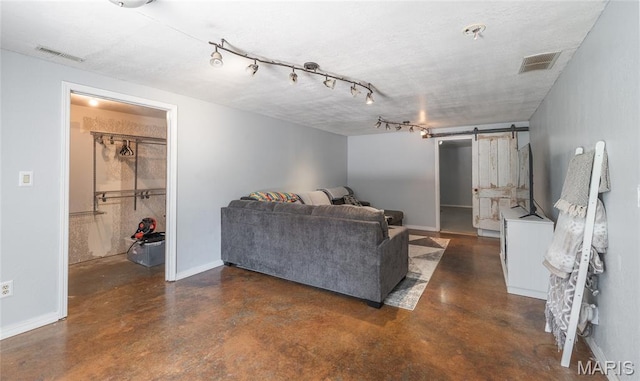305 Pine Tree Rd, Rolla, MO 65401 - living area with finished concrete flooring and a barn door