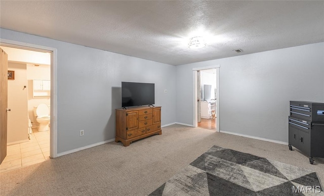 305 Pine Tree Rd, Rolla, MO 65401 - unfurnished living room with carpet and a textured ceiling