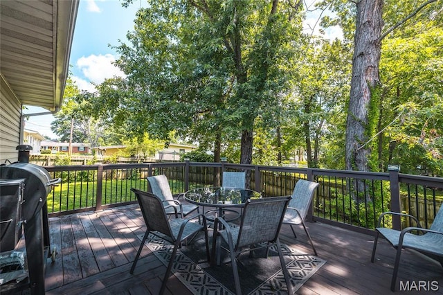 305 Pine Tree Rd, Rolla, MO 65401 - wooden terrace with a grill and outdoor dining space