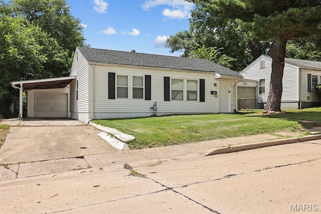 345 Mueller Ave, Ferguson, MO 63135 - bungalow-style home with a front lawn, concrete driveway, and a shingled roof