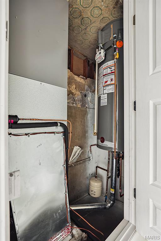 345 Mueller Ave, Ferguson, MO 63135 - utility room with water heater