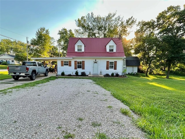 1409 S Washington St, Salem, MO 65560 - cape cod house featuring gravel driveway, a front lawn, and a metal roof
