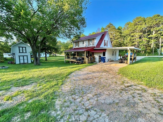 1409 S Washington St, Salem, MO 65560 - rear view of house with a storage shed and a yard