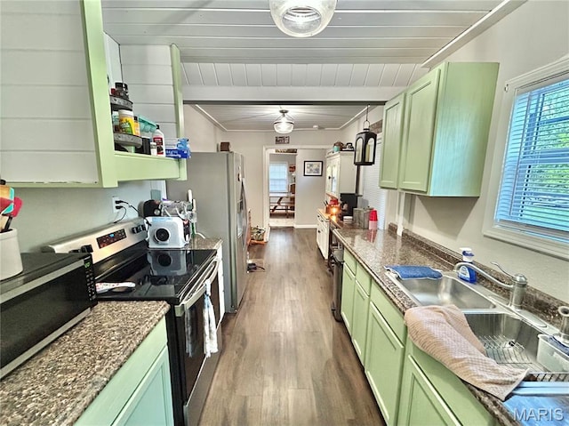 1409 S Washington St, Salem, MO 65560 - kitchen with appliances with stainless steel finishes, green cabinetry, and dark wood-style flooring