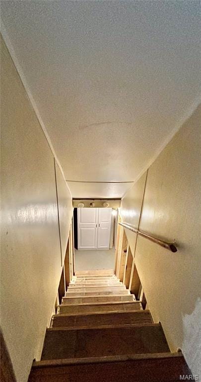 1409 S Washington St, Salem, MO 65560 - stairs featuring a textured ceiling