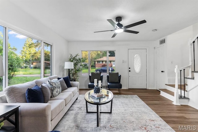 911 Cordova St, Saint Ferdinand Township, MO 63138 - living room with ceiling fan, stairs, and wood finished floors